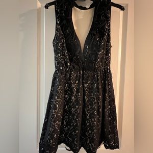 In used condition black sleeveless dress